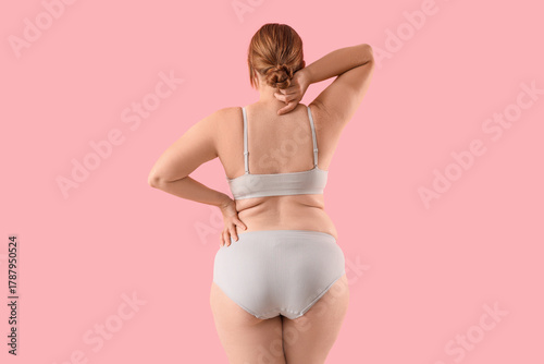 Overweight woman in underwe...