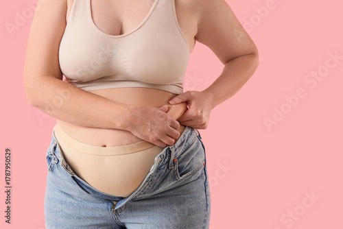 Overweight woman in tight j...