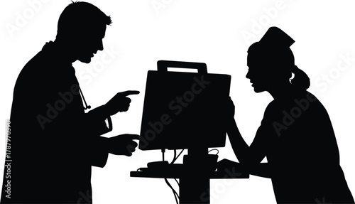 Healthcare professionals silhouette working on computer Doctor pointing at monitor during consultation with nurse