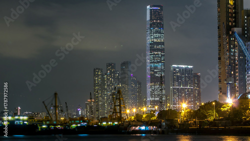 Wallpaper Mural Hong Kong business center day to night timelapse with a cloudy blue sky after sunset Torontodigital.ca