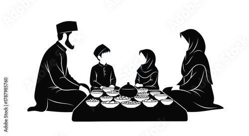 A family gathered around a table enjoying a meal together in silhouette