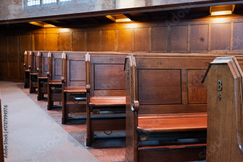 Foto Empty, wooden church pews or benches inside protestant church, no people
