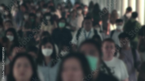Large crowd of business people with medical face mask. Air pollution. Blurred defocused view of Concept of coronavirus, covid 19 quarantine,	