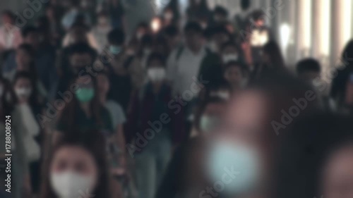 Large crowd of business people with medical face mask. Air pollution. Blurred defocused view of Concept of coronavirus, covid 19 quarantine,	