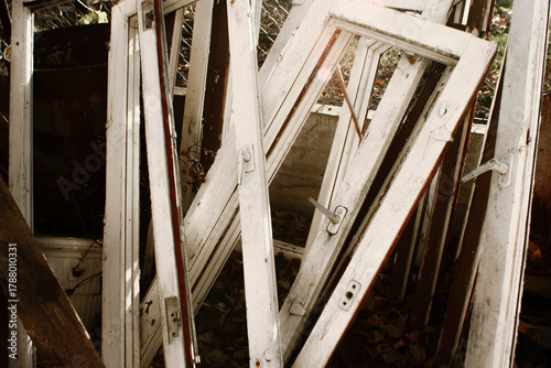 Stack of Old Window Frames – Weathered Wood & Metal Handles