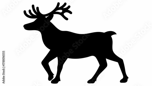 Majestic silhouette of a stag with impressive antlers gracefully walking, symbolizing nature's power and elegance for your designs.