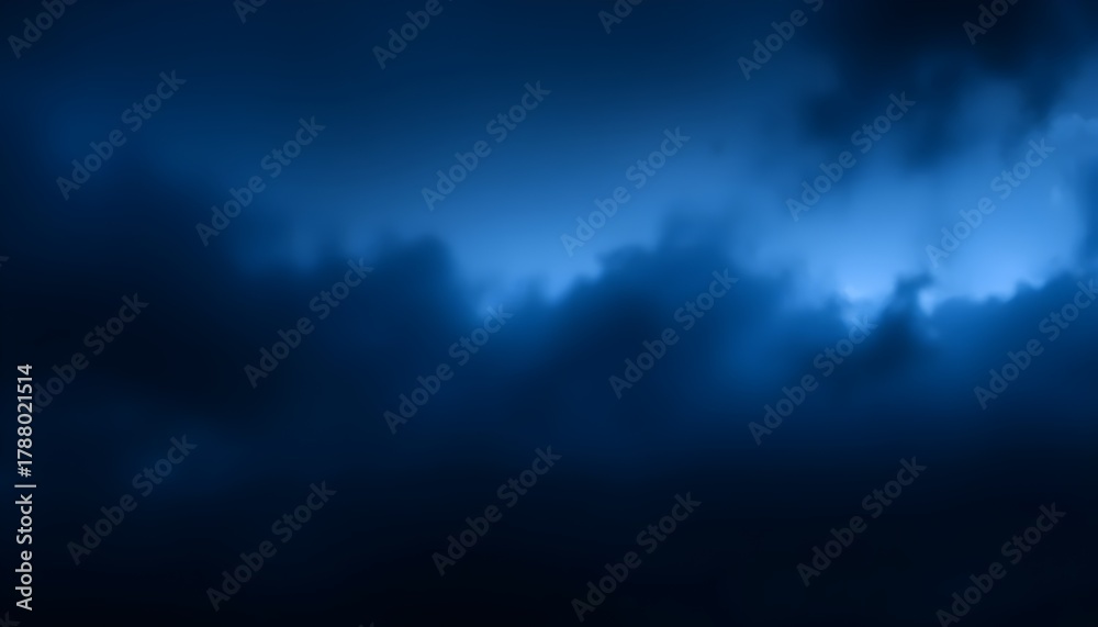 Fototapeta premium Moody dark blue storm clouds with soft fog, dramatic atmospheric sky and abstract weather background