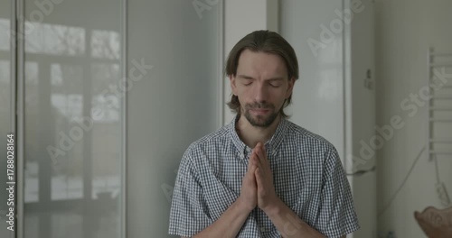 Man is Eating Breakfast in Kitchen. 4K 10-bit