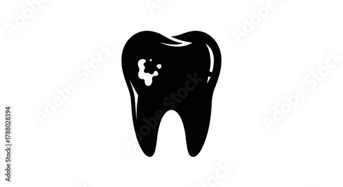 Black silhouette of a human tooth with a small cavity.