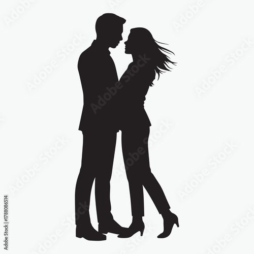 Romantic couple silhouette embracing closely against a plain background