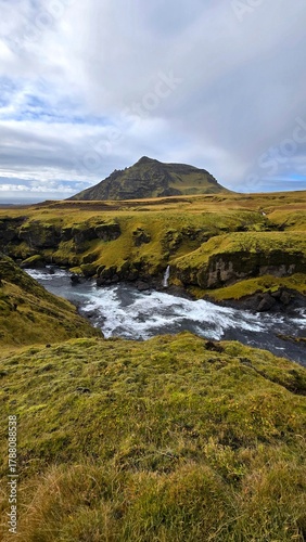 A peaceful yet powerful waterfall along the Skógá river in Iceland, captured on the way to Skógafoss. A scenic moment from the famous Waterfall Way hike.