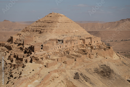 View of Ksar Guermessa located under the peak of Ras Oum Moutmana, Tunisia
