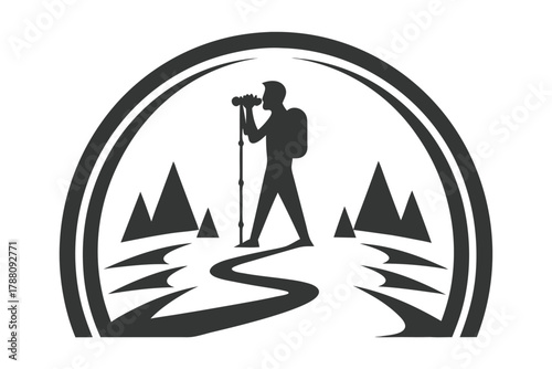 An adventurous person with a backpack walks and enjoys mountain scenery through binoculars