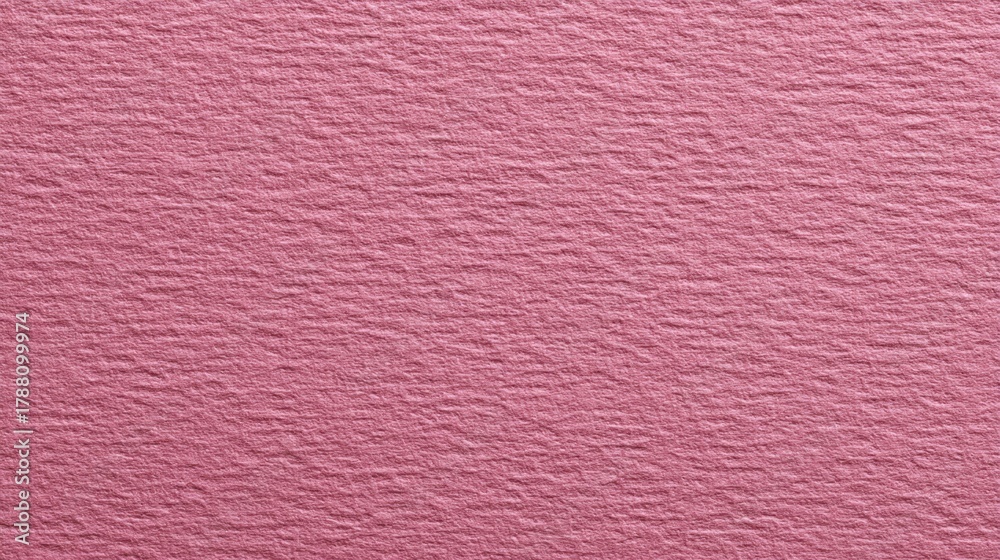 Fototapeta premium Textured pink paper with a subtle pattern, ideal for backgrounds, stationery, and creative projects, showcasing a soft and warm aesthetic appeal.