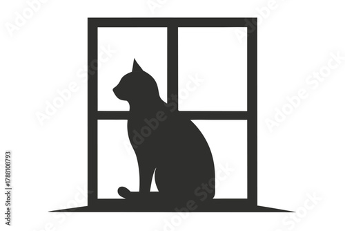 Silhouette of domestic cat gazing outward while sitting within a divided window pane