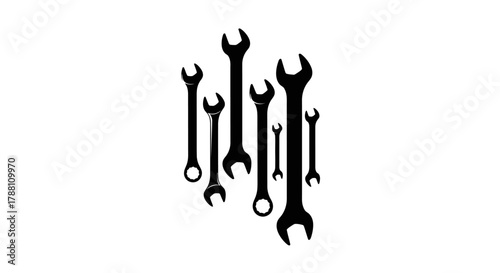 A collection of black wrenches of various sizes arranged in a vertical pattern against a white background.
