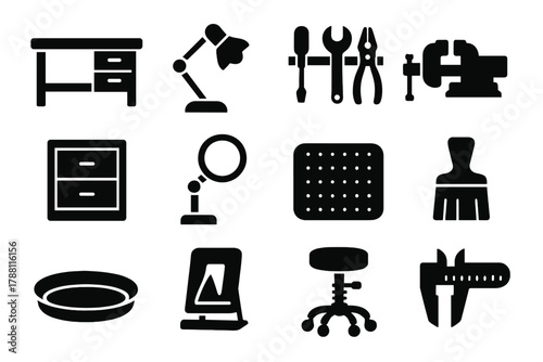 Workshop Icon Set. Solid style icons of Workshop setup: workbench, lamp, tool rack, vice clamp, storage drawer, magnifier stand,