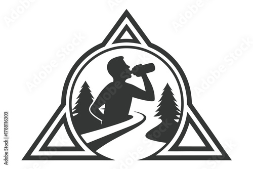 Silhouette of a man drinking water during a hike inside triangle frame