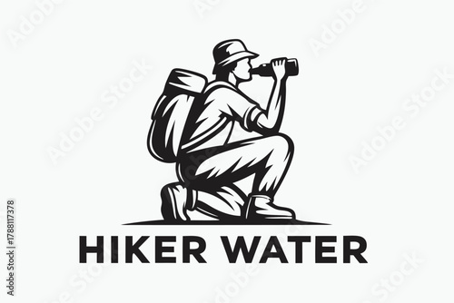 Silhouette shows hiker with backpack kneeling and drinking water from bottle in black and white
