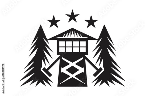 Silhouette shows lookout tower surrounded by pine trees and stars overhead in black and white