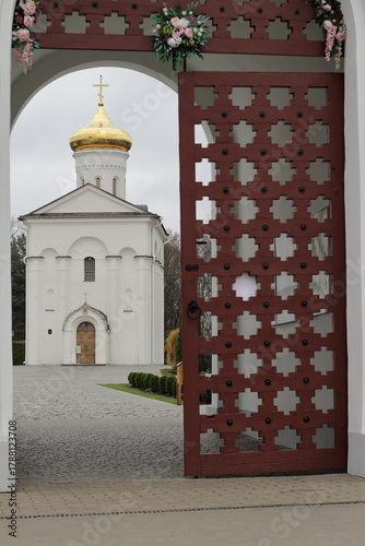 View through the monastery gates to the Church of the Transfiguration of the Lord in the Spaso-Euphrosyne Monastery in Polotsk.