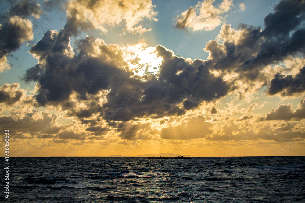 Fototapeta premium Sunset and dramatic clouds at Noshappu Cape, Wakkanai City, Hokkaido, Japan