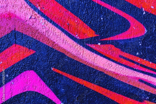 Vibrant graffiti wall art in pink, red, blue. 90s urban aesthetic, bold colors, street style. Posters, digital art, funky visual displays, city decor.