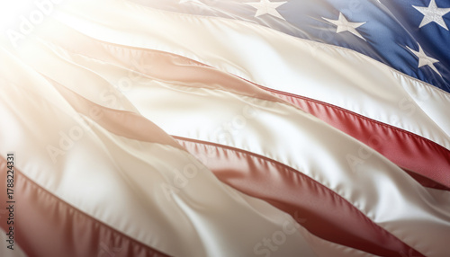 USA flag background. Waving American flag in sunlight flare, close up