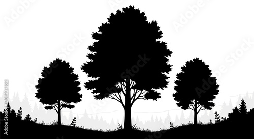 Monochrome Forest Silhouette with Hillside and Distant Trees Creating a Serene Ambiance