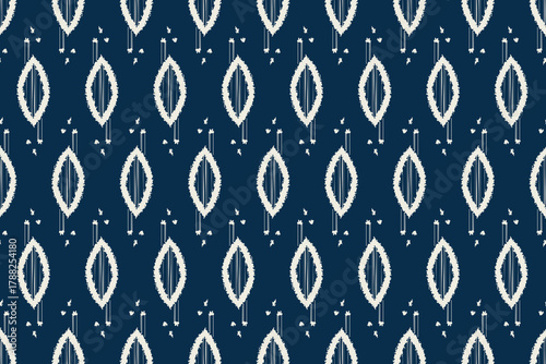 Abstract Indigo and White Ikat Ogee Pattern Seamless Background. Ethnic, geometric print is ideal for contemporary fashion, home decor, digital paper, fabric printing, wallpaper, backgrounds