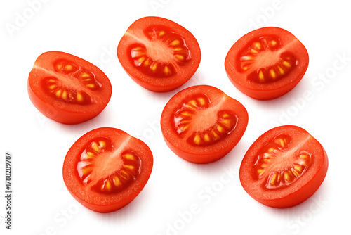 Ripe red cherry tomatoes sliced in half showing fresh pulp and seeds, perfect cooking ingredients on transparent background