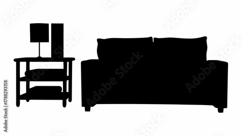 Silhouette of a sofa and a bedside table with a lamp and a decorative element in a dark color scheme
