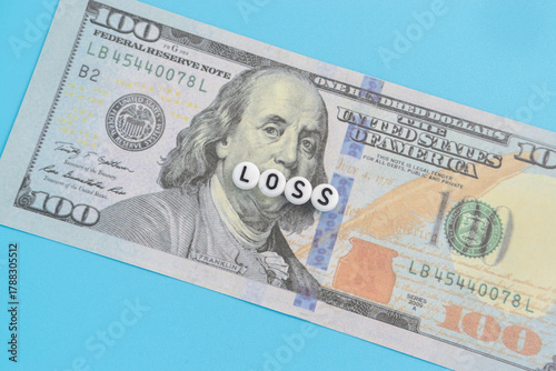 Dollar banknote with text Loss
