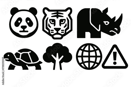 Endangered Icons Set. Endangered Species Essentials silhouette icon set: panda, tiger, elephant, rhino, turtle, tree, globe, warning sign.