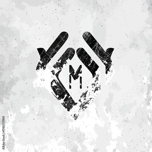 Grungy black abstract hands framing the letter M, modern distressed graphic design on a textured light background. Stylish emblem icon.