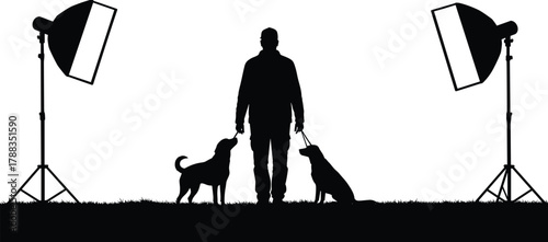 Silhouette of man training two dogs in studio with lighting equipment, pet obedience, photography concept, animal training illustration art