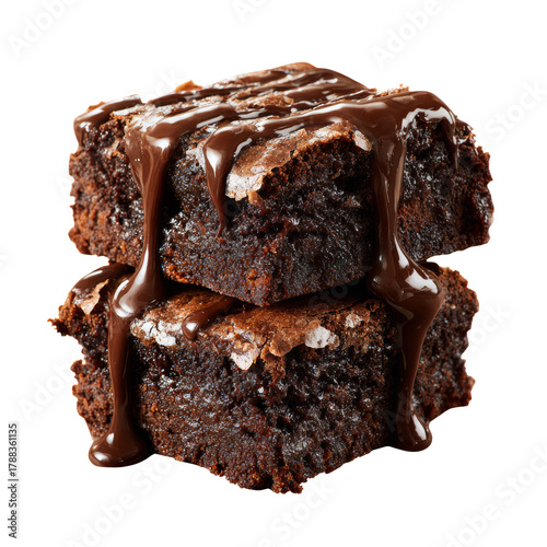 Stacked chocolate fudgy brownies with flowing sauce on transparent background
