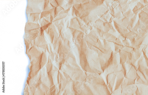 Wrinkled brown kraft paper background with natural torn edge and soft shadows. Perfect for eco design, packaging, stationery mockups, and creative craft or artistic texture compositions.