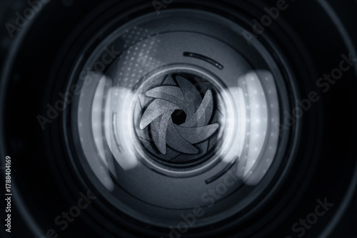 Black camera lens aperture blades closeup