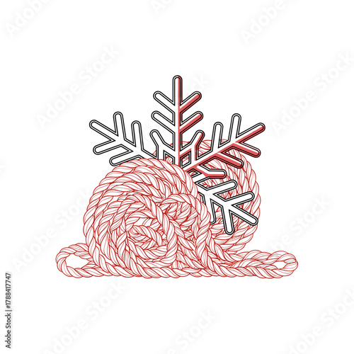 Close up of a snowflake resting on a woolen ball of yarn  