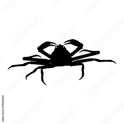 Black silhouette of a large crab with spread legs and claws