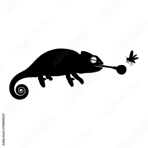 Silhouette of a chameleon catching a fly with its tongue