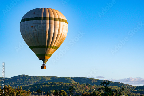 Hot Air Balloon Flying High Above the Island of Ibiza