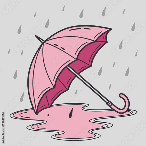 Pink umbrella in rain puddle with falling raindrops