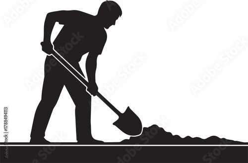 Silhouette of a man digging with a shovel on a representing hard work