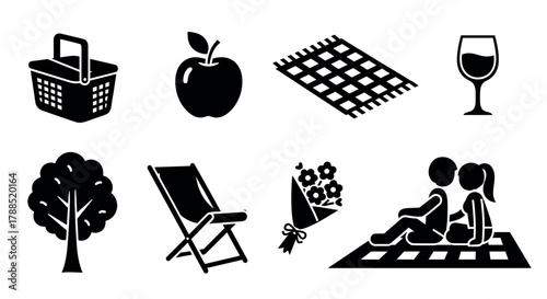 A series of black silhouette icons depicting picnic elements, including a basket, apple, blanket, glass of wine, tree, deck chair, flower bouquet, and a couple sitting on a blanket.