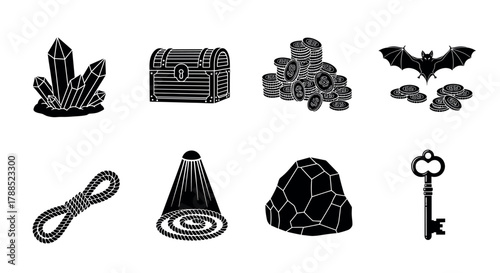 Collection of eight black silhouette icons featuring a crystal cluster, treasure chest, stacked coins, bat, rope loop, volcano, rock, and vintage key with a heart-shaped top.