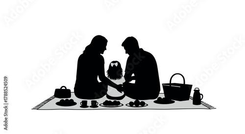 Silhouette of a family having a picnic, featuring two adults and a child sitting on a blanket with food and bags.