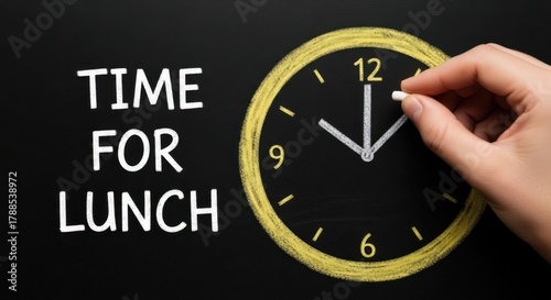 Hand adjusting clock hands signaling time for a delicious lunch break