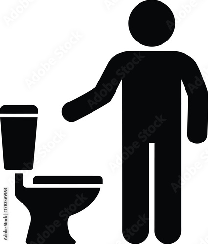 Man standing next to toilet icon for restroom signage design